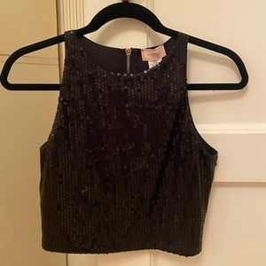 Love…ady black sequin crop too with leather back! Perfect for New Year’s Eve